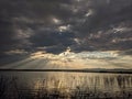 August Sumer storm with sun rays