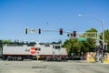 August 30, 2017 Sunnyvale/CA/USA - Caltrain crossing at a street junction near a residential neighborhood in south San Francisco Royalty Free Stock Photo