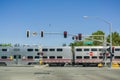 August 30, 2017 Sunnyvale/CA/USA - Caltrain crossing at a street junction near a residential neighborhood in south San Francisco Royalty Free Stock Photo