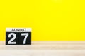 August 27th. Image of august 27, calendar on yellow background with empty space for text. Summer time Royalty Free Stock Photo