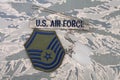 August 31, 2020. US AIR FORCE branch tape and Master Sergeant rank patch and dog tags on digital tiger-stripe pattern Airman