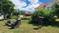 Garden of Butoiul Sasului restaurant, in Ganesti, Romania. Royalty Free Stock Photo