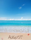 August written on a tropical beach Royalty Free Stock Photo