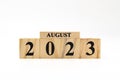 August 2023 written on wooden blocks isolated on white background with copy space Royalty Free Stock Photo