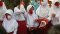 9 August 2020, Yogyakarta, Indonesia: Children from Indonesia wear primary school clothes and wear masks