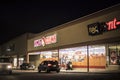 Big lots Family Dollar Rent A center stores at night and people Royalty Free Stock Photo