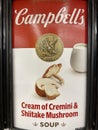 Campbells soup labels on a retail store gravity feeder Cremini