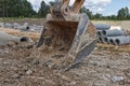 CAT backhoe earth mover at a construction site bucket Royalty Free Stock Photo