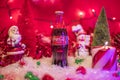 Christmas 1997 Glass Coca Cola bottle and Holiday scene Santa striped candle