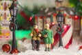 Coca Cola Holiday Vintage Village collection scene Town Square seniors on a bench