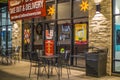 Cold Stone Ice Cream parlor outside dining patio tables