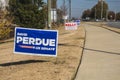 David Perdue Kelly Loffler senate election signs in on a lawn on Belair road