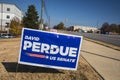 David Perdue Kelly Loeffler senate election signs in on a lawn on Belair road 2021