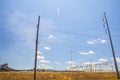 Distant view of an industrial scene and power lines