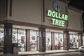 Dollar Tree at night entrance and building sign