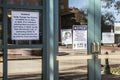 Downtown Augusta Convention Center covid-19 signs on doors close up