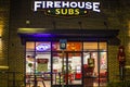 Firehouse Subs restaurant at night building sign