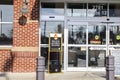 The Fresh Market retail grocery store entrance and covid-19 sign