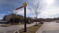 Hardees fast food restaurant exterior drive thru hungry sign Royalty Free Stock Photo