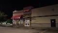 Hardees fast food restaurant at night side view background traffic