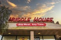 Huddle House Restaurant closed building sign front of building