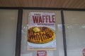 Huddle House Restaurant closed Free waffle poster in the window
