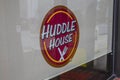 Huddle House Restaurant closed logo in the window