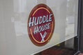 Huddle House Restaurant closed logo in the window