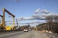 Huge Heavy industrial road machines and cranes on a bridge construction site top copyspcae traffic