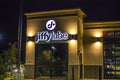 Jiffy Lube at night sign and building