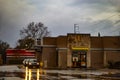 McDonalds fast food restaurant in the rain drive cars in the drive thru