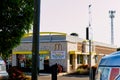 McDonalds Now Hiring banner sign on building