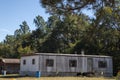 Old dilapidated trailer home rusted