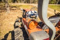 Old orange farm tractor rear tail light Royalty Free Stock Photo