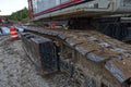 Road construction site close up of a crane roller wheel Royalty Free Stock Photo