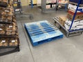 Walmart retail store interior empty pallet on the sales floor