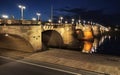 Augustus Bridge illuminated at night, arching over the Elbe River in Dresden, Germany Royalty Free Stock Photo