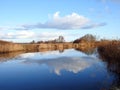 Aukstumalos river and beautiful cloudy sky , Lithuania