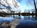 Aukstumalos river, home and trees, Lithuania