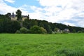 Aull, Germany - 08 02 2021: Lahn valley with camping site, boats in the Lahn and Schloss Oranienstein under light clouds