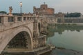 aurelius bridge with illumination over the river tiber in the background angels castle with clouds