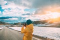 Aurlandsfjellet, Norway. Young Happy Woman Tourist Traveler Photographer Taking Pictures Photos Of Aurlandsfjellet Royalty Free Stock Photo