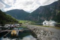 cruise liner and boats moored near majestic mountains at Aurlandsfjord Flam (Aurlandsfjorden) Norway