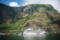 cruise liner and boats near majestic mountains at Aurlandsfjord Flam (Aurlandsfjorden) Norway
