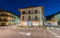 AURONZO, ITALY - JULY 6, 2016: City center with road intersections at night. Auronzo is a famous dolomites town Royalty Free Stock Photo