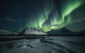 Aurora Above the Arctic Mountains