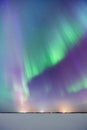 Aurora Borealis above frozen lake Royalty Free Stock Photo