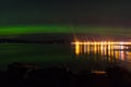 Aurora borealis above town of Hornafjordur in Iceland Royalty Free Stock Photo