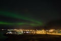 Aurora borealis above town of Hornafjordur in Iceland Royalty Free Stock Photo