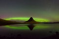 Aurora Borealis and Church Mountain reflecting in a pond